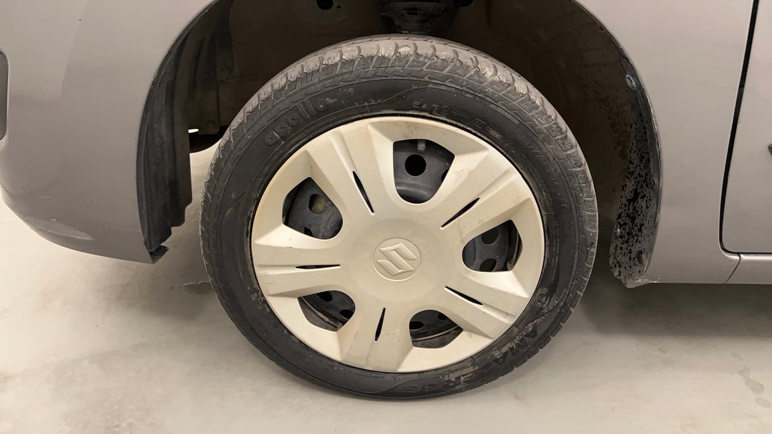 Used 2014 Maruti Suzuki Wagon R VXI Petrol Manual tyres LEFT FRONT TYRE RIM VIEW