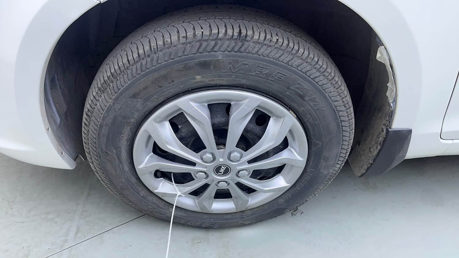 Used 2015 Maruti Suzuki Swift Dzire VXI Petrol Manual tyres LEFT FRONT TYRE RIM VIEW