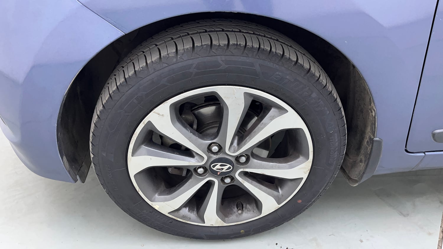 Used 2014 Hyundai Xcent SX 1.2 (O) Petrol Manual tyres LEFT FRONT TYRE RIM VIEW