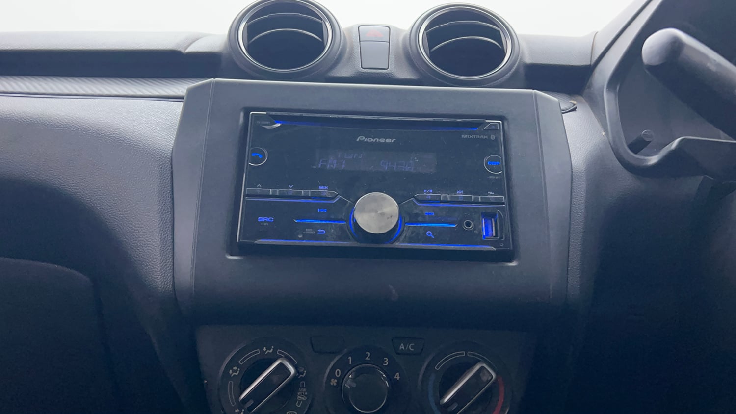 Used 2018 Maruti Suzuki Swift LXi Petrol Manual interior MUSIC SYSTEM & AC CONTROL VIEW