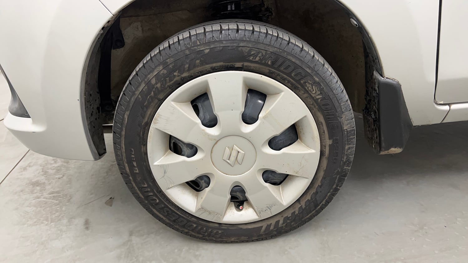 Used 2015 Maruti Suzuki Alto K10 VXi Petrol Manual tyres LEFT FRONT TYRE RIM VIEW