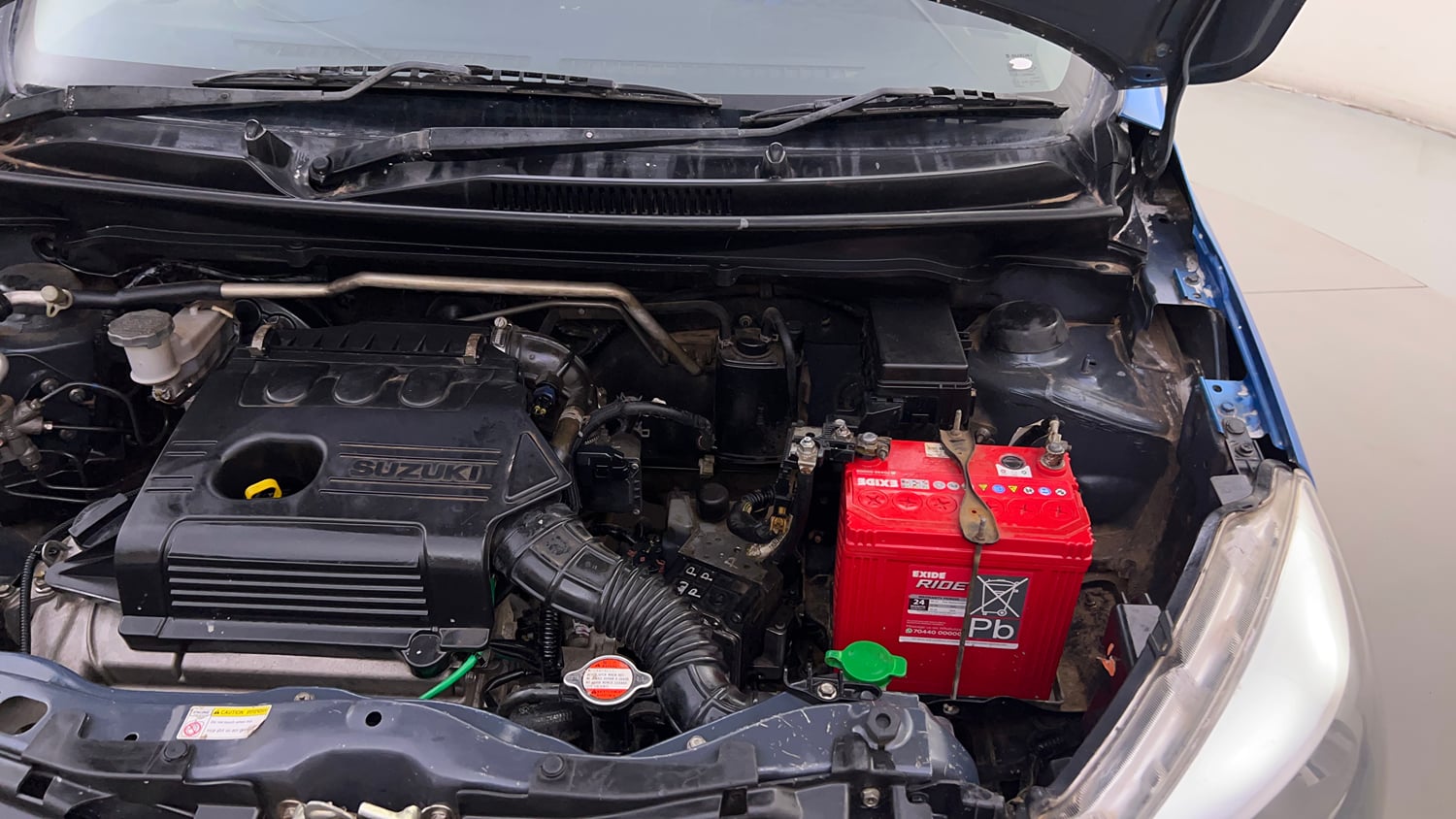Used 2016 Maruti Suzuki Celerio VXi AMT Petrol Automatic engine ENGINE LEFT SIDE HINGE & APRON VIEW