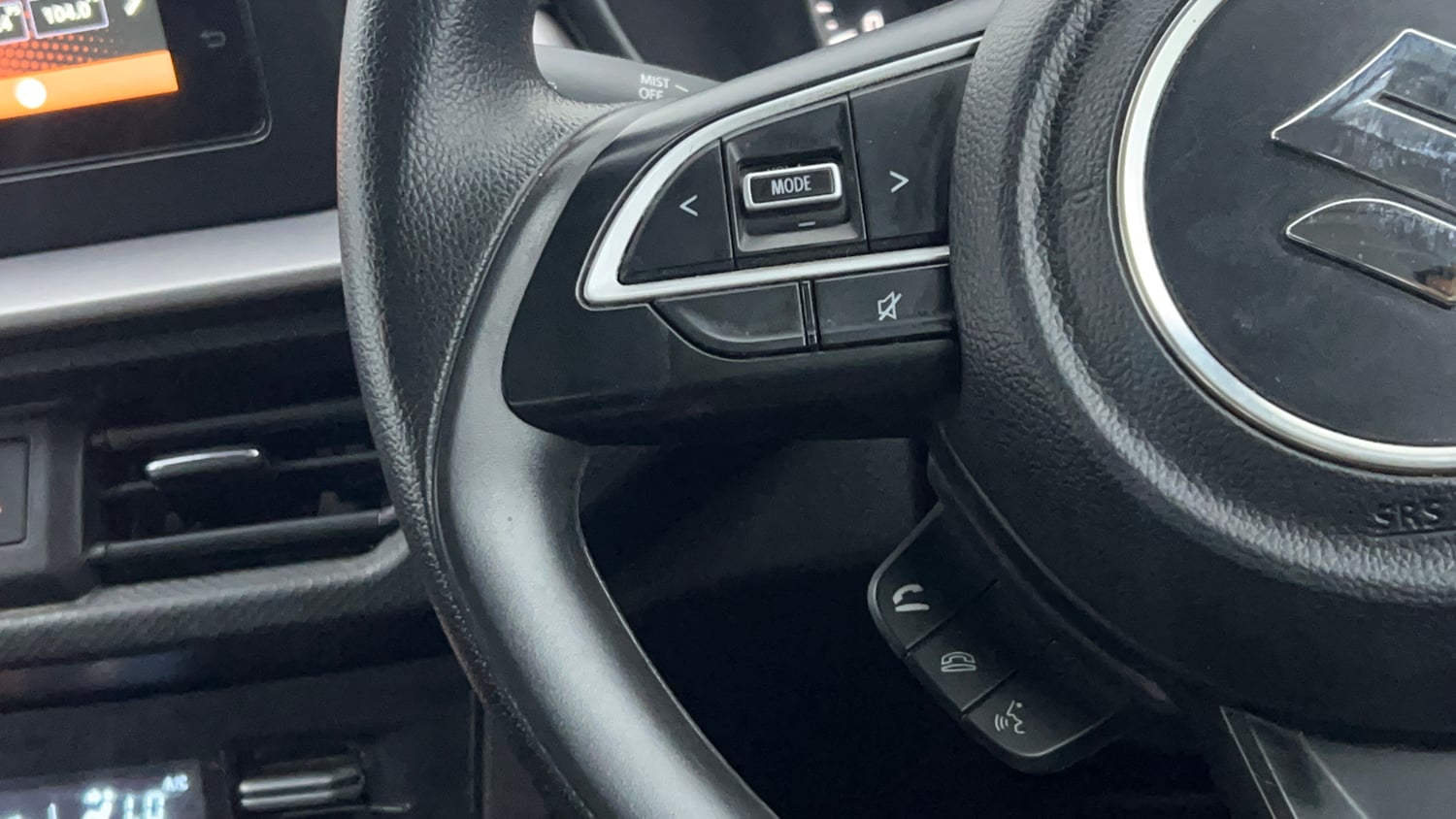 Used 2023 Maruti Suzuki Brezza VXi Petrol Manual top_features Steering mounted controls