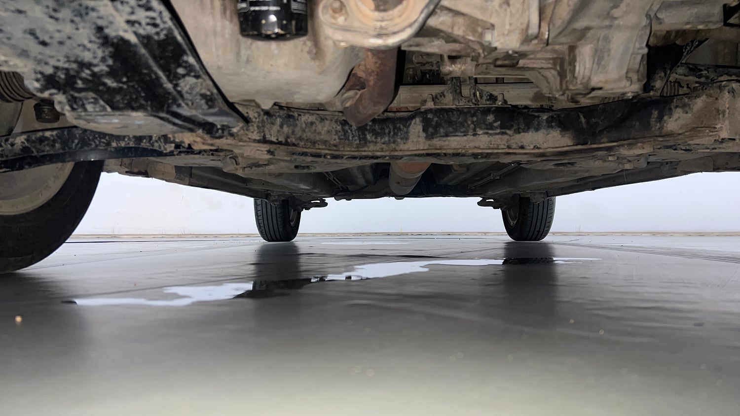 Used 2014 Maruti Suzuki Swift Dzire ZXI Petrol Manual extra FRONT LEFT UNDERBODY VIEW