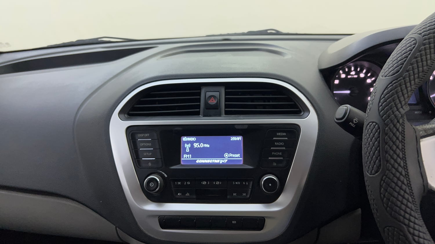 Used 2017 Tata Tiago Revotorq XT Diesel Manual top_features Integrated (in-dash) music system