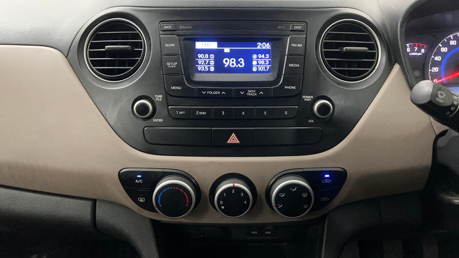 Used 2016 Hyundai Grand i10 Sportz 1.2 Kappa VTVT Petrol Manual interior MUSIC SYSTEM & AC CONTROL VIEW
