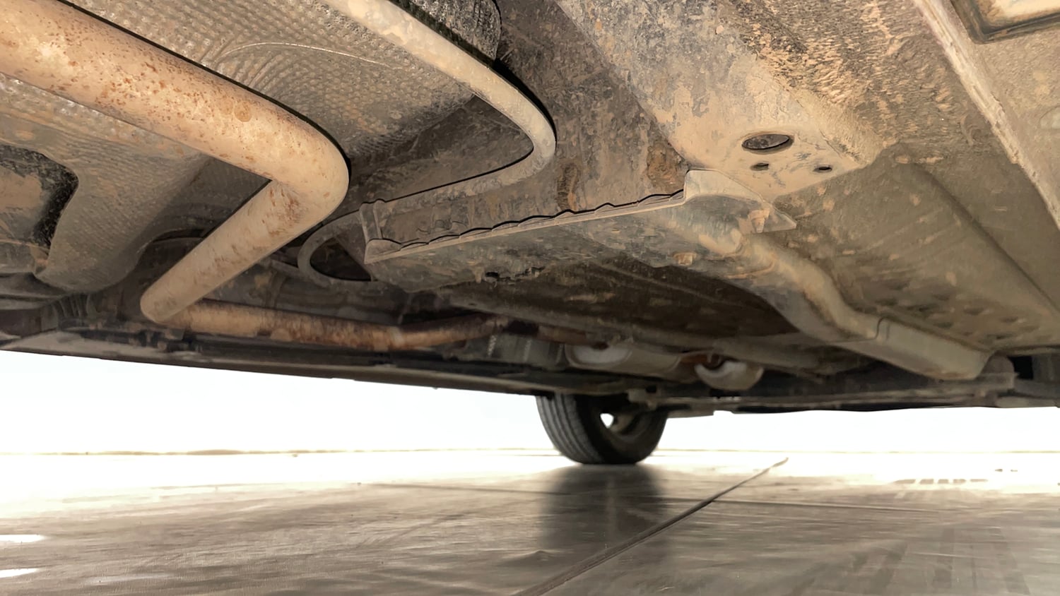 Used 2023 Hyundai New i20 Asta (O) 1.2 IVT Petrol Automatic extra REAR RIGHT UNDERBODY VIEW