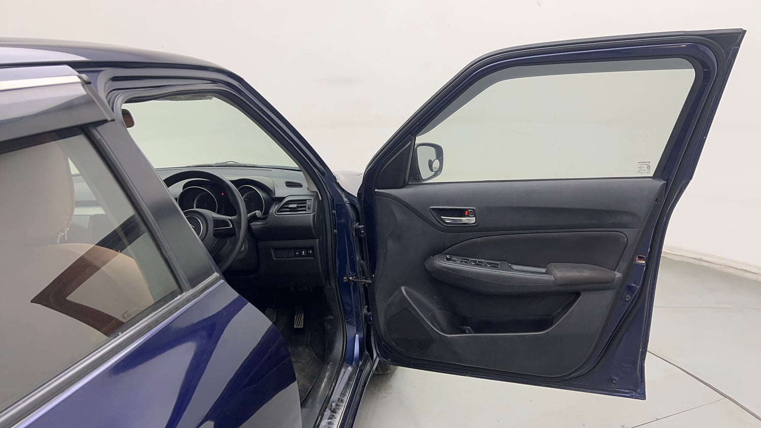 Used 2023 Maruti Suzuki Swift VXi Petrol Manual interior RIGHT FRONT DOOR OPEN VIEW