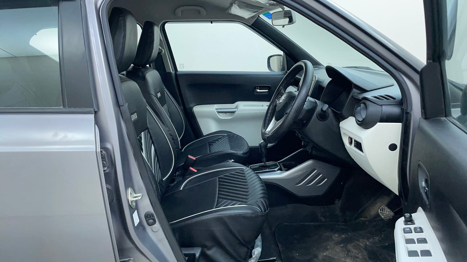 Used 2024 Maruti Suzuki Ignis Zeta 1.2 AMT Petrol Automatic interior RIGHT SIDE FRONT DOOR CABIN VIEW