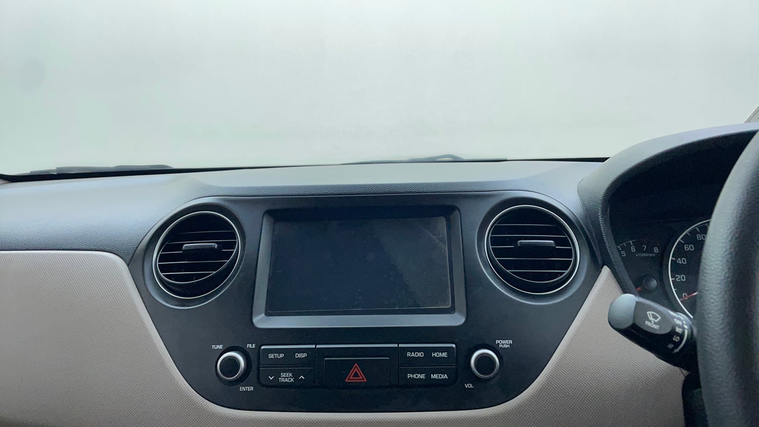 Used 2019 Hyundai Grand i10 Sportz 1.2 Kappa VTVT Petrol Manual top_features Integrated (in-dash) music system