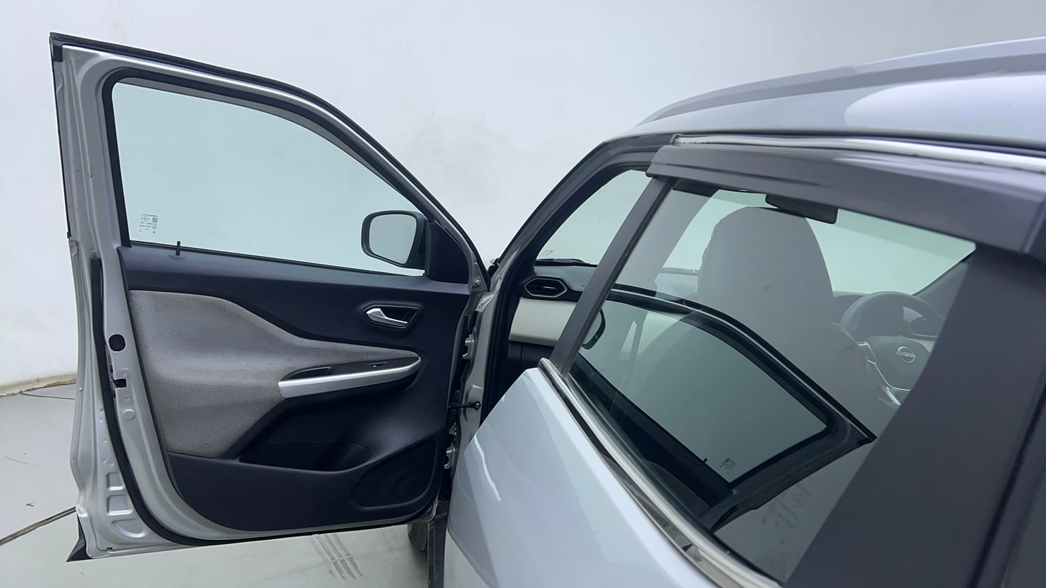 Used 2023 Nissan Magnite XL Petrol Manual interior LEFT FRONT DOOR OPEN VIEW