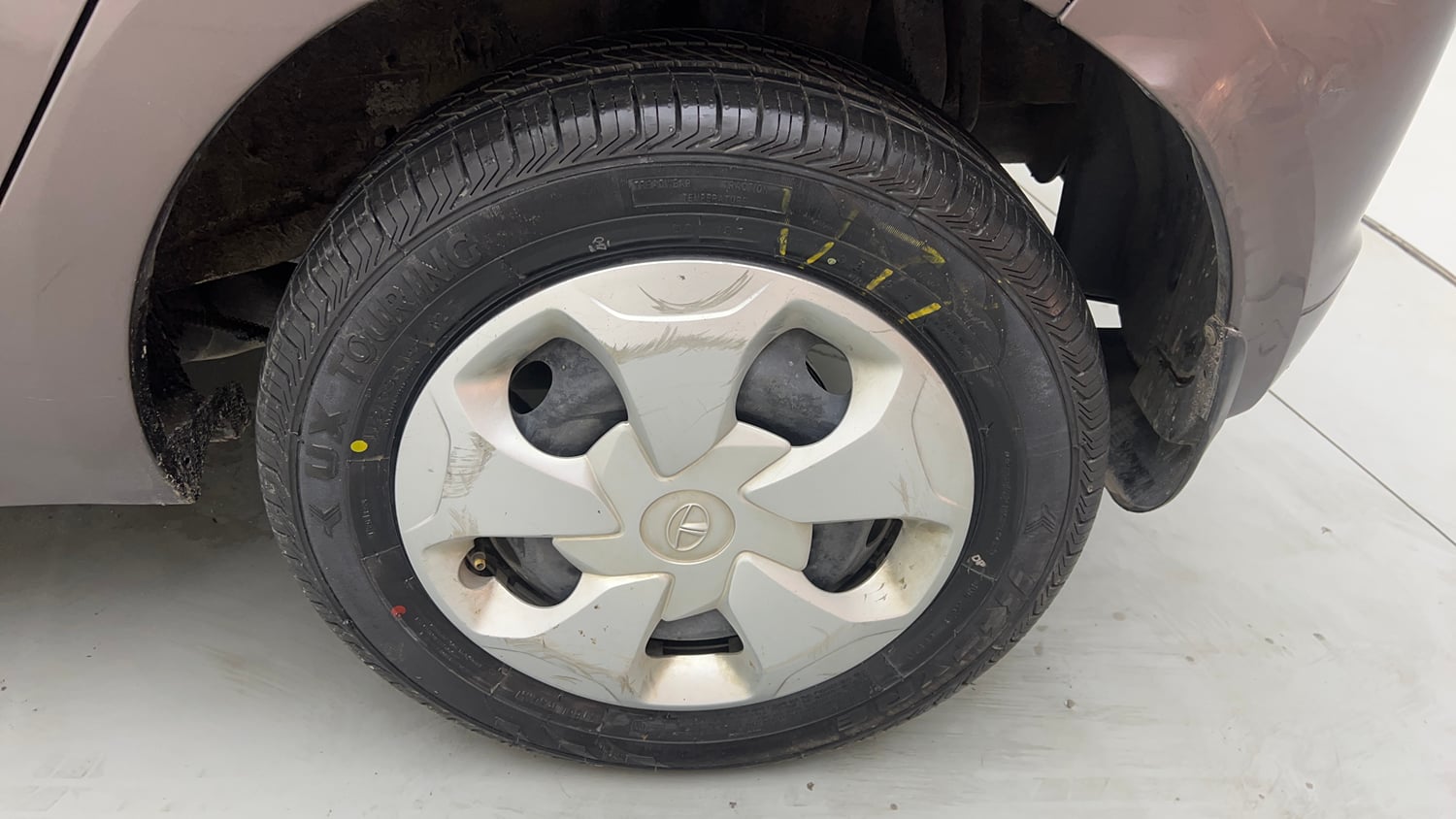 Used 2018 Tata Tiago Revotron XT Petrol Manual tyres LEFT REAR TYRE RIM VIEW