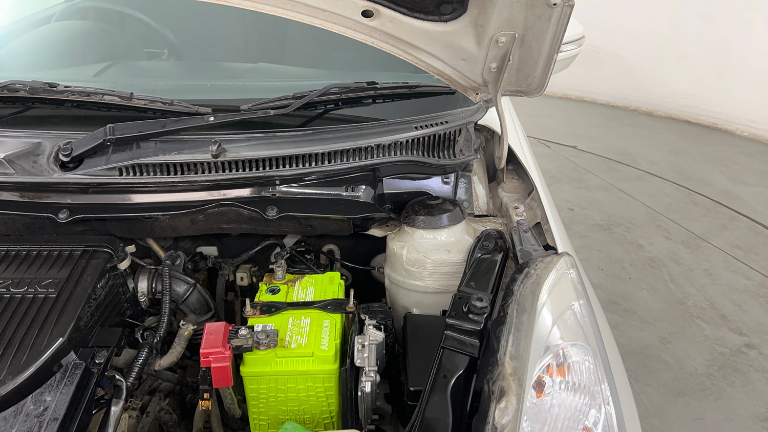 Used 2012 Maruti Suzuki Swift VXi Petrol Manual engine ENGINE LEFT SIDE HINGE & APRON VIEW