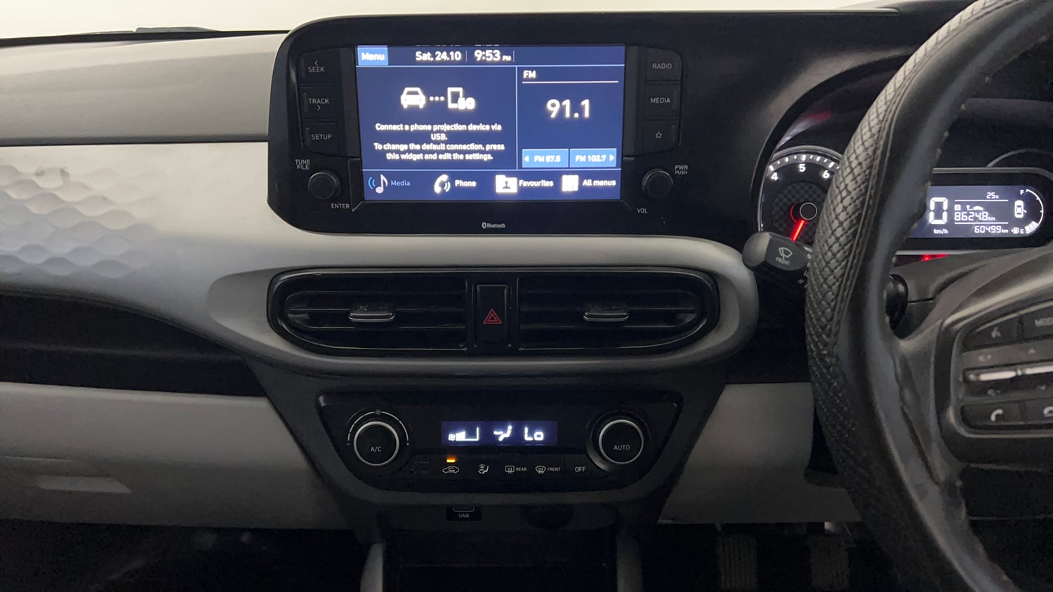 Used 2021 Hyundai Grand i10 Nios Sportz 1.2 Kappa VTVT Petrol Manual interior MUSIC SYSTEM & AC CONTROL VIEW