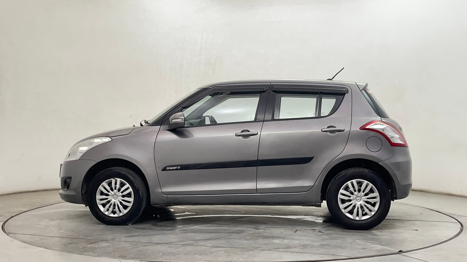 Used 2012 Maruti Suzuki Swift VXi Petrol Manual exterior LEFT SIDE VIEW