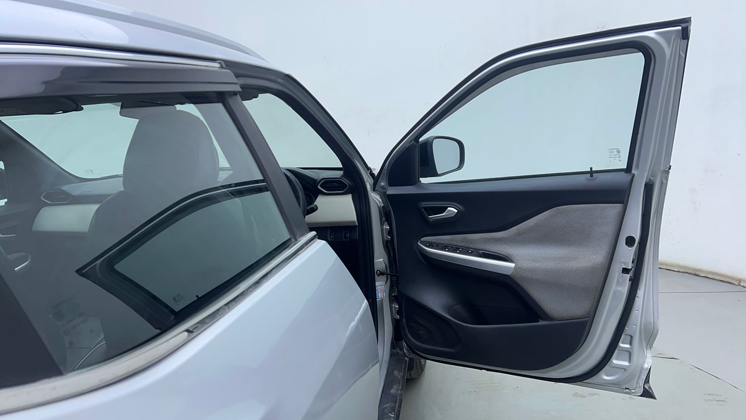 Used 2023 Nissan Magnite XL Petrol Manual interior RIGHT FRONT DOOR OPEN VIEW