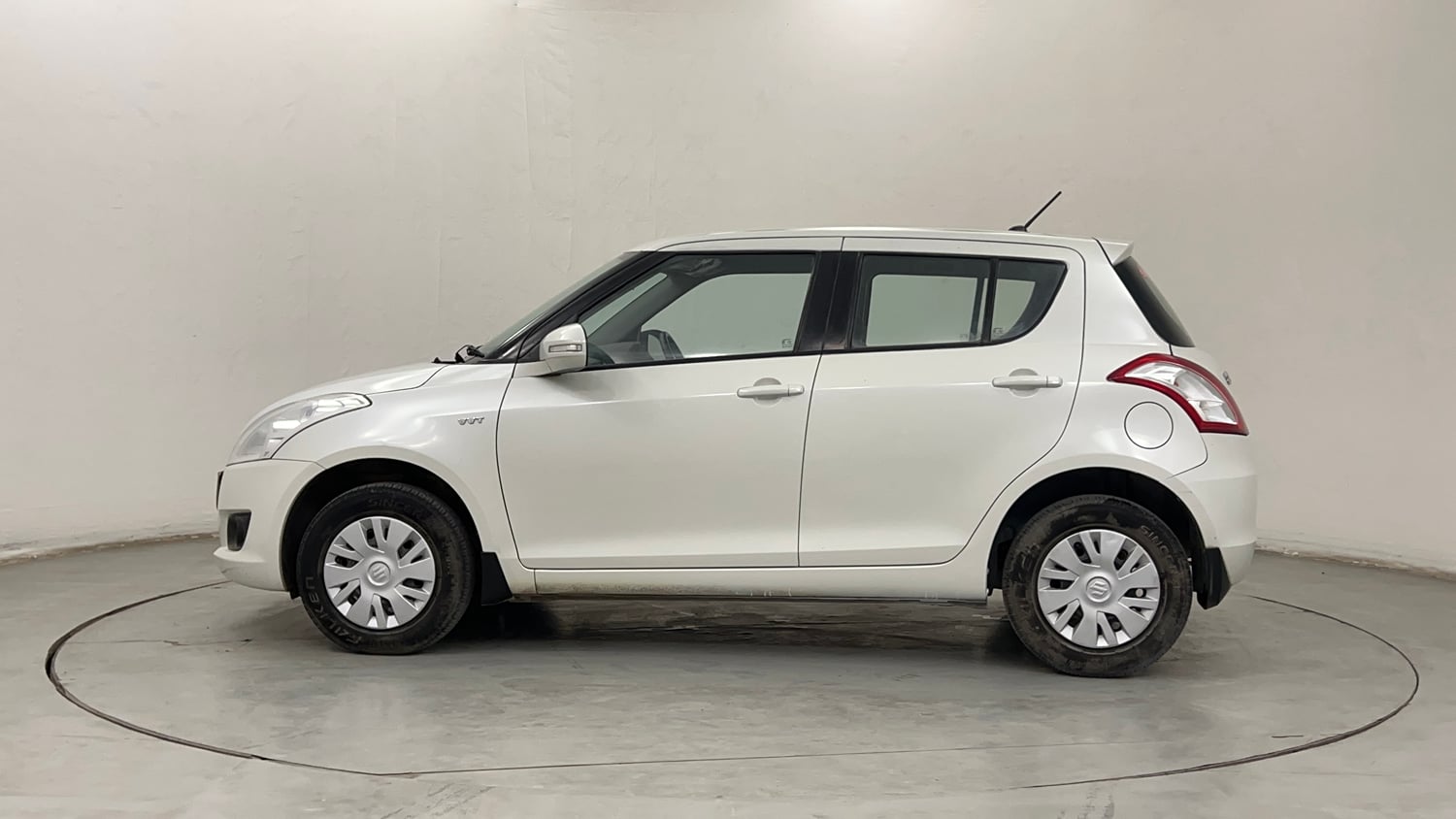 Used 2012 Maruti Suzuki Swift VXi Petrol Manual exterior LEFT SIDE VIEW