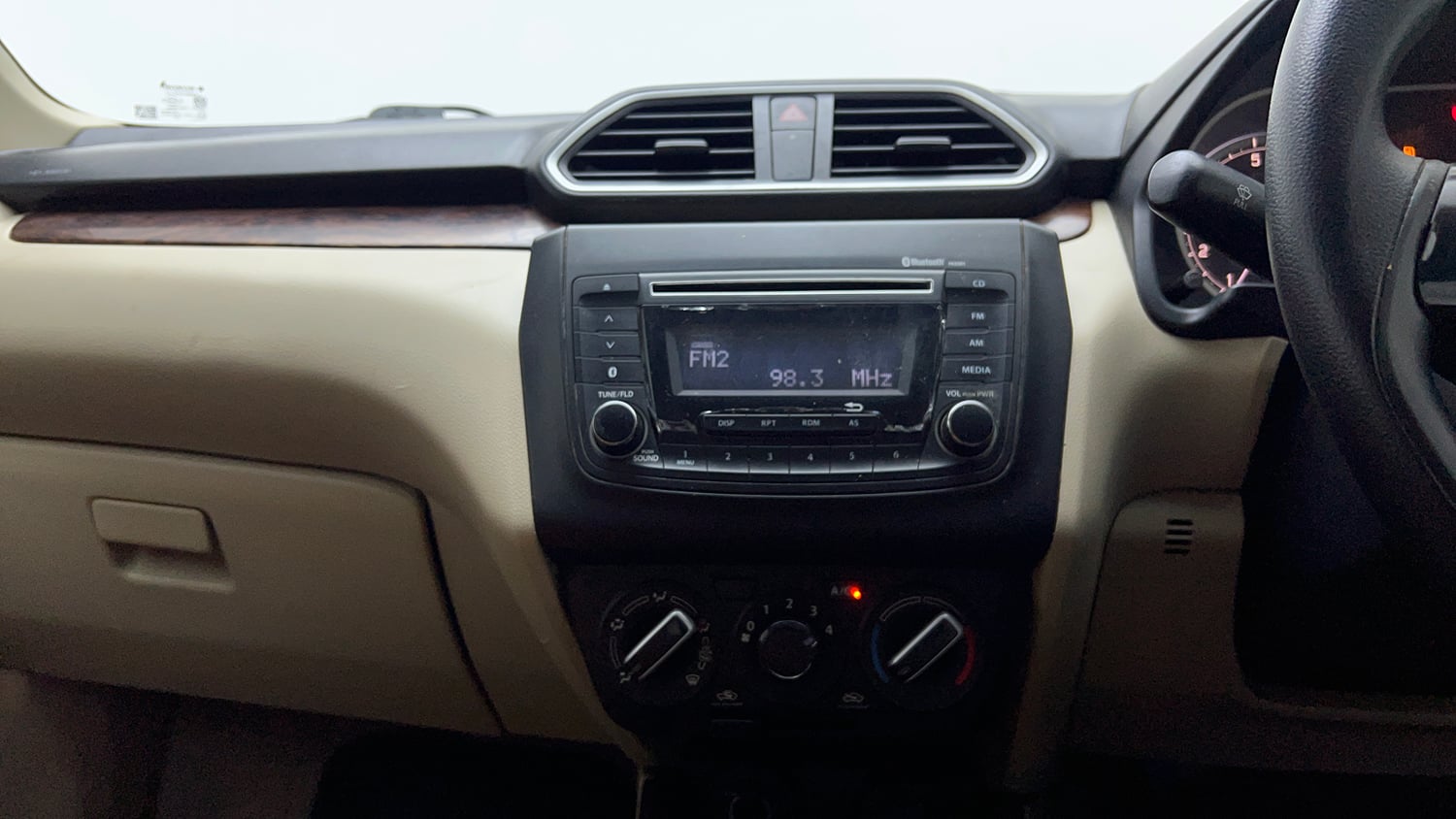 Used 2017 Maruti Suzuki Dzire VXi Petrol Manual top_features Integrated (in-dash) music system