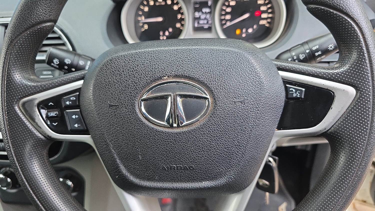 Used 2017 Tata Tiago Revotron XZ Petrol Manual top_features Steering mounted controls