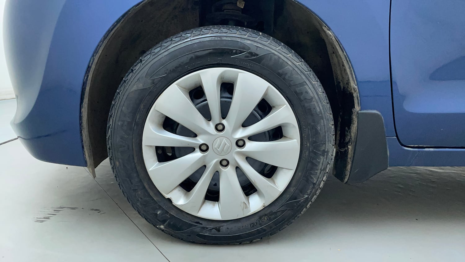 Used 2018 Maruti Suzuki Baleno Delta 1.2 Petrol Manual tyres LEFT FRONT TYRE RIM VIEW