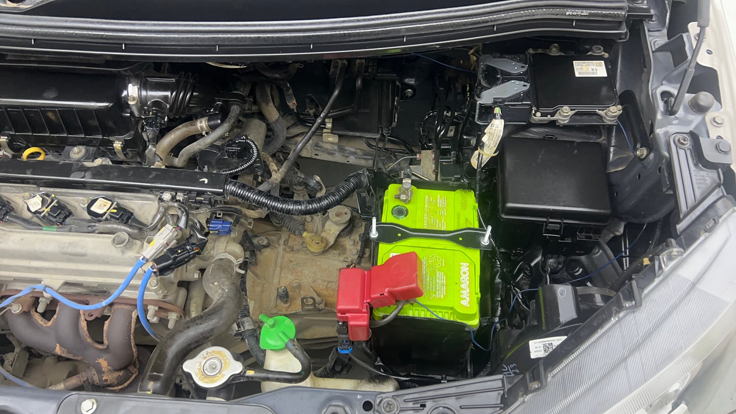 Used 2021 Maruti Suzuki Wagon R 1.0 VXi 1.0 Petrol Manual engine ENGINE LEFT SIDE VIEW