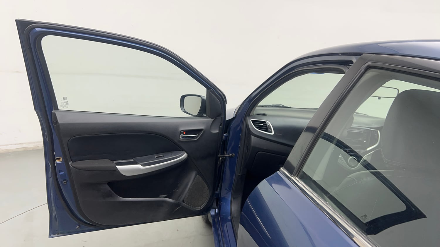 Used 2017 Maruti Suzuki Baleno Delta 1.2 Petrol Manual interior LEFT FRONT DOOR OPEN VIEW