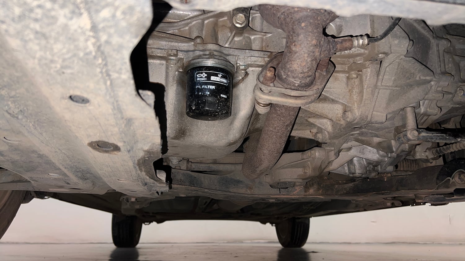 Used 2020 Maruti Suzuki Baleno Zeta Petrol Manual extra FRONT LEFT UNDERBODY VIEW