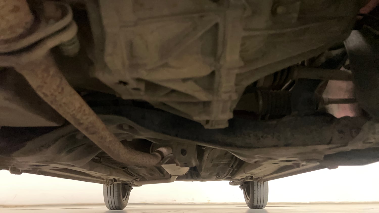 Used 2014 Maruti Suzuki Celerio VXi AMT Petrol Automatic extra FRONT LEFT UNDERBODY VIEW