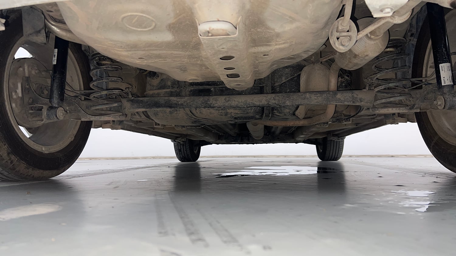 Used 2014 Maruti Suzuki Swift Dzire ZXI Petrol Manual extra REAR UNDERBODY VIEW (TAKEN FROM REAR)