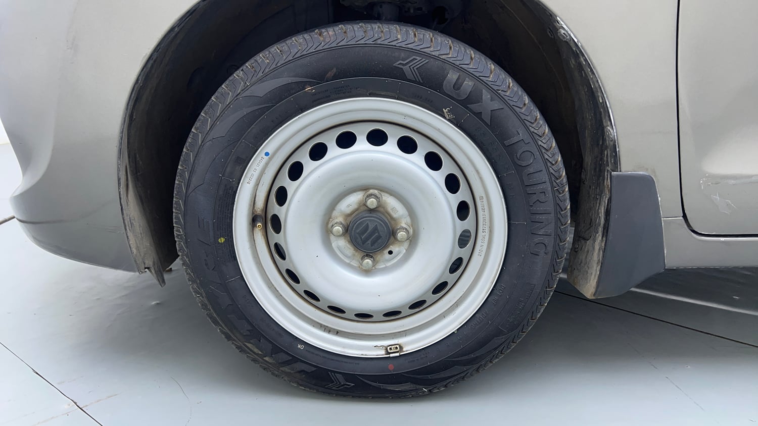 Used 2021 Maruti Suzuki Baleno Sigma Petrol Manual tyres LEFT FRONT TYRE RIM VIEW