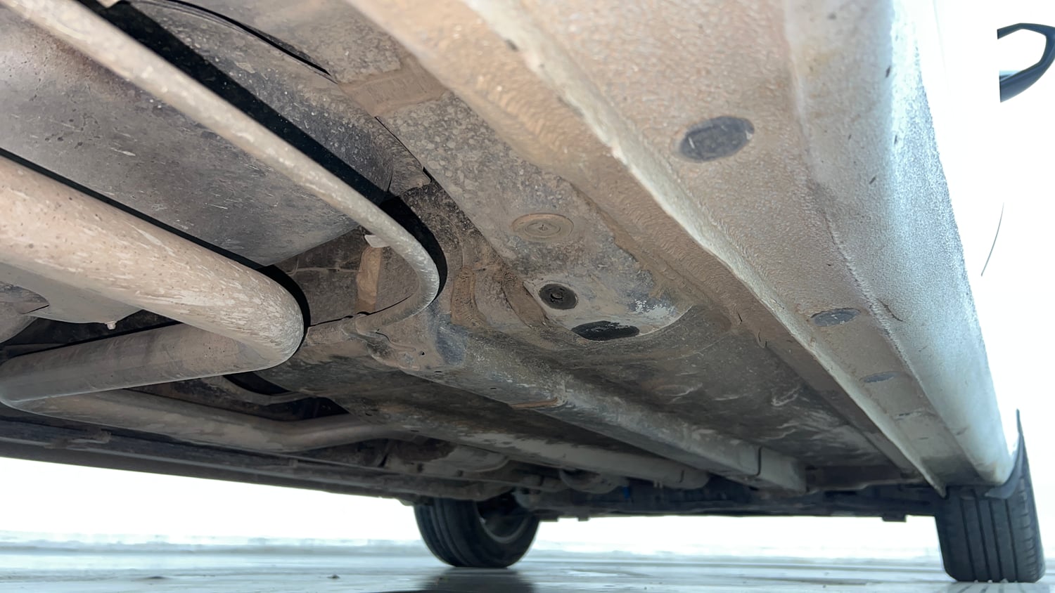Used 2024 Hyundai Verna SX 1.5 Petrol MT Petrol Manual extra REAR RIGHT UNDERBODY VIEW