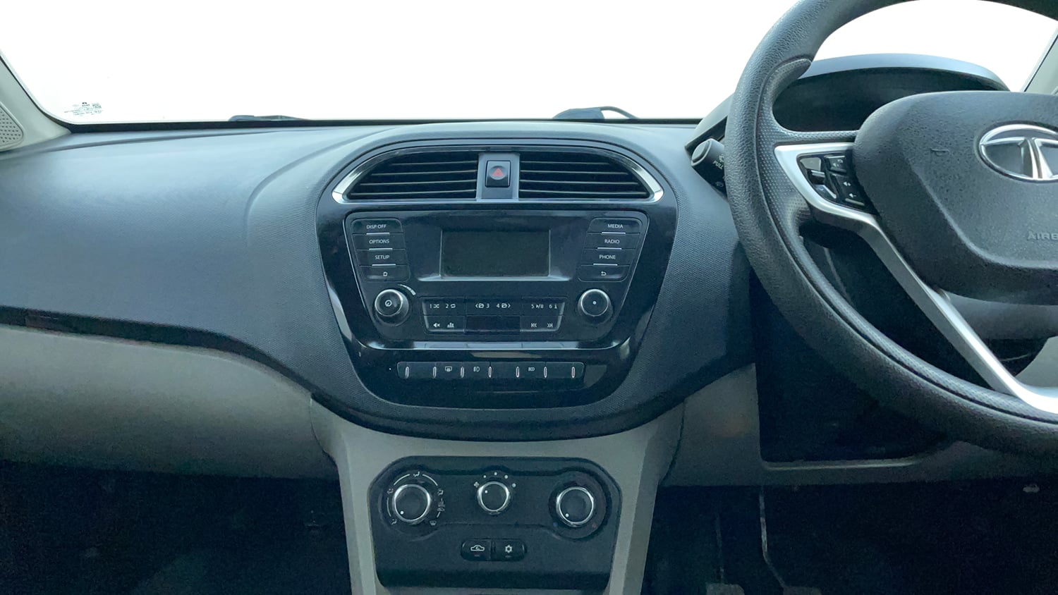Used 2017 Tata Tiago Revotron XZ Petrol Manual interior MUSIC SYSTEM & AC CONTROL VIEW
