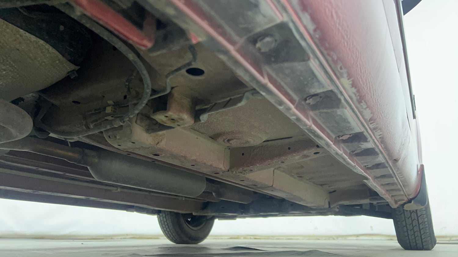 Used 2014 Maruti Suzuki Swift VXi Petrol Manual extra REAR RIGHT UNDERBODY VIEW