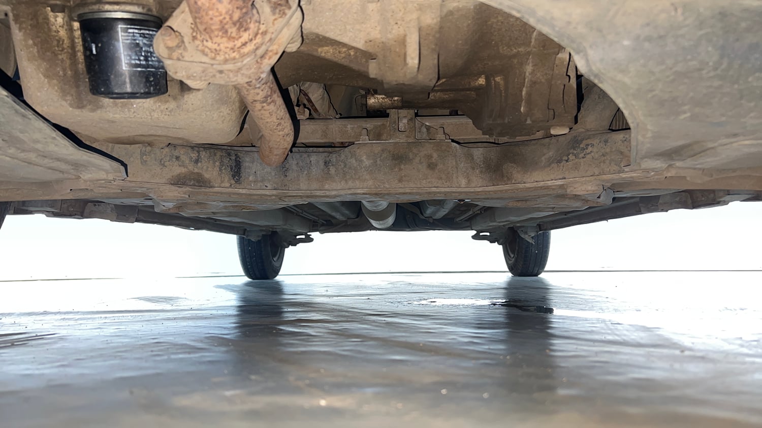 Used 2015 Maruti Suzuki Swift VXi Petrol Manual extra FRONT LEFT UNDERBODY VIEW