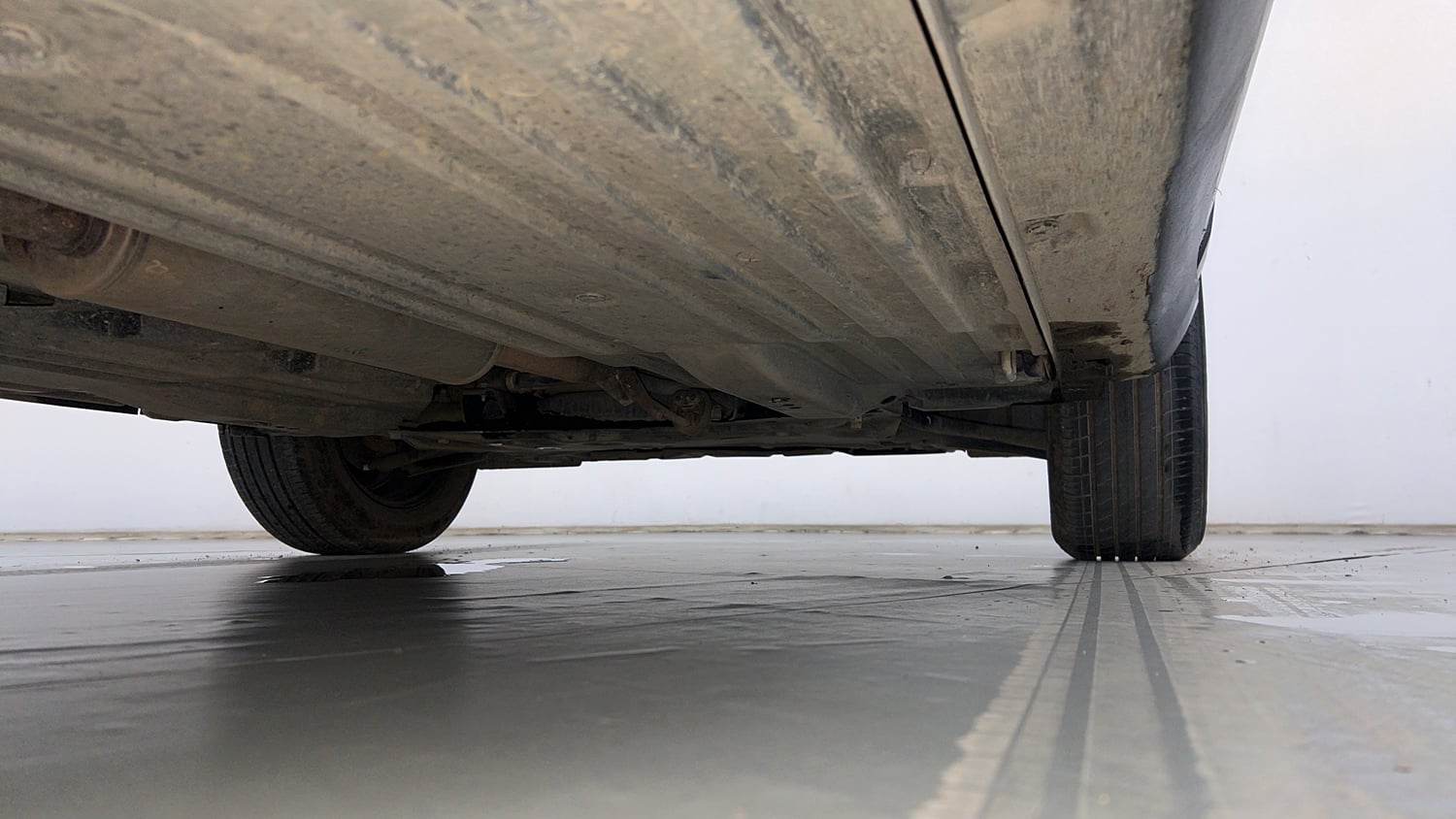 Used 2023 Maruti Suzuki Brezza VXi Petrol Manual extra REAR RIGHT UNDERBODY VIEW