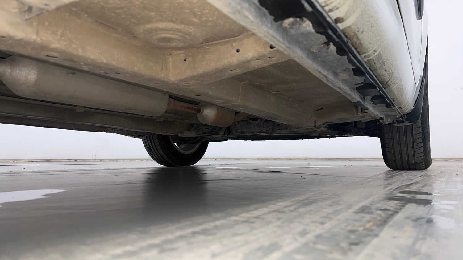 Used 2014 Maruti Suzuki Swift Dzire ZXI Petrol Manual extra REAR RIGHT UNDERBODY VIEW