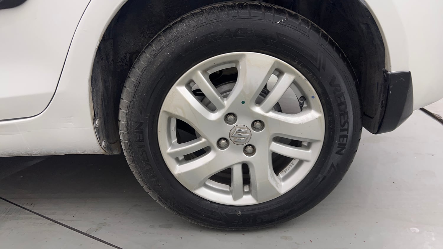 Used 2014 Maruti Suzuki Swift Dzire ZXI Petrol Manual tyres LEFT REAR TYRE RIM VIEW