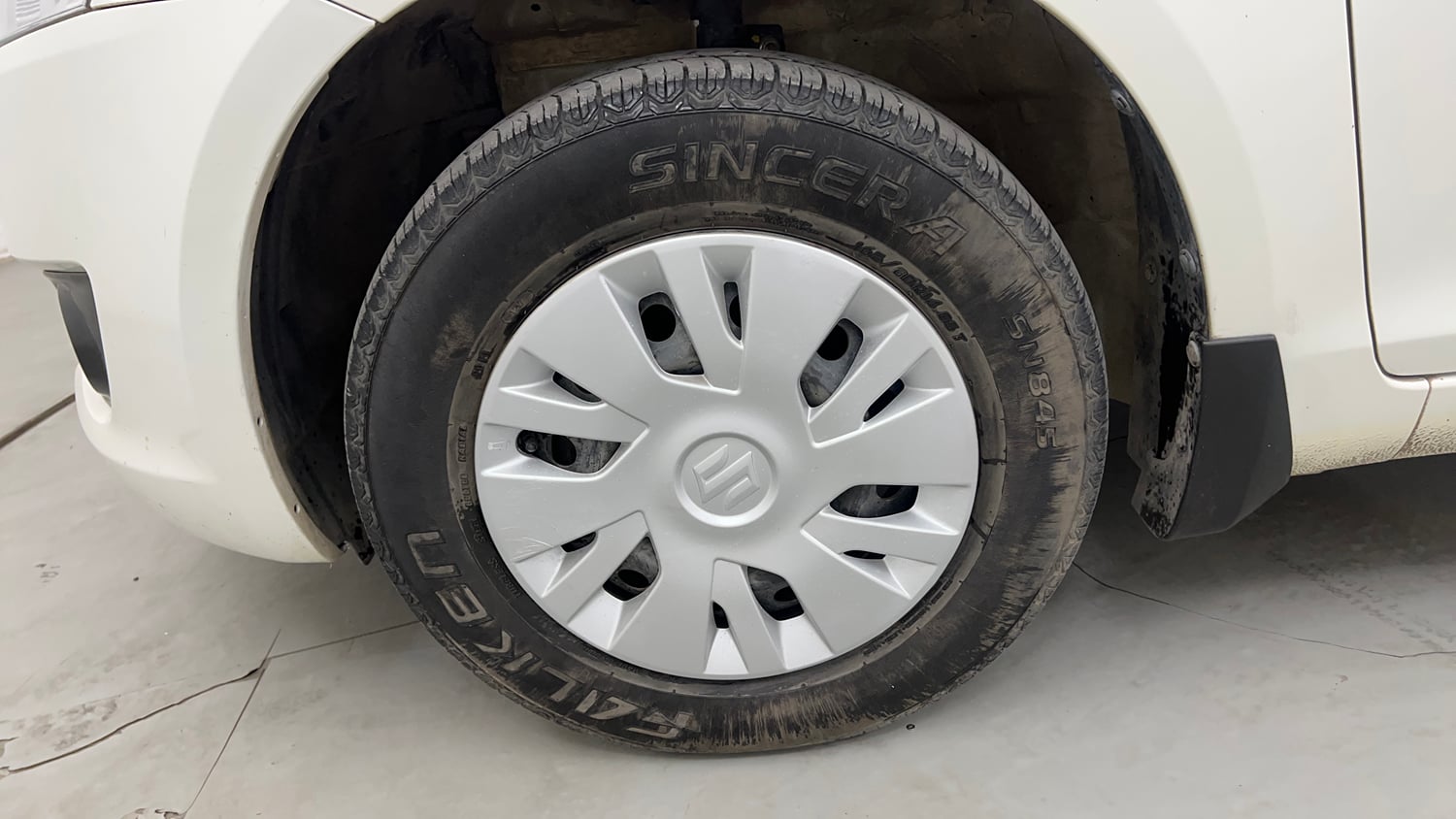 Used 2012 Maruti Suzuki Swift VXi Petrol Manual tyres LEFT FRONT TYRE RIM VIEW