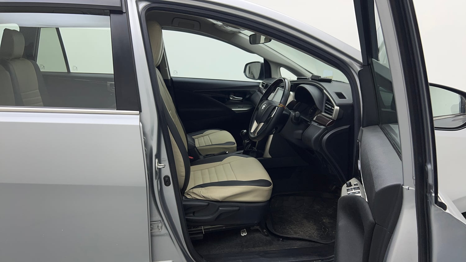 Used 2022 Toyota Innova Crysta VX 2.7 7 STR Petrol Manual interior RIGHT SIDE FRONT DOOR CABIN VIEW