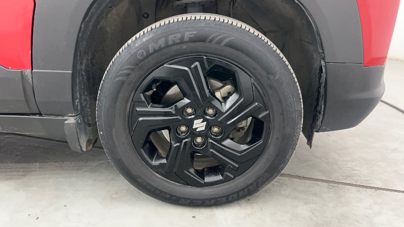 Used 2023 Maruti Suzuki Brezza Zxi Dual Tone Petrol Manual tyres LEFT FRONT TYRE RIM VIEW