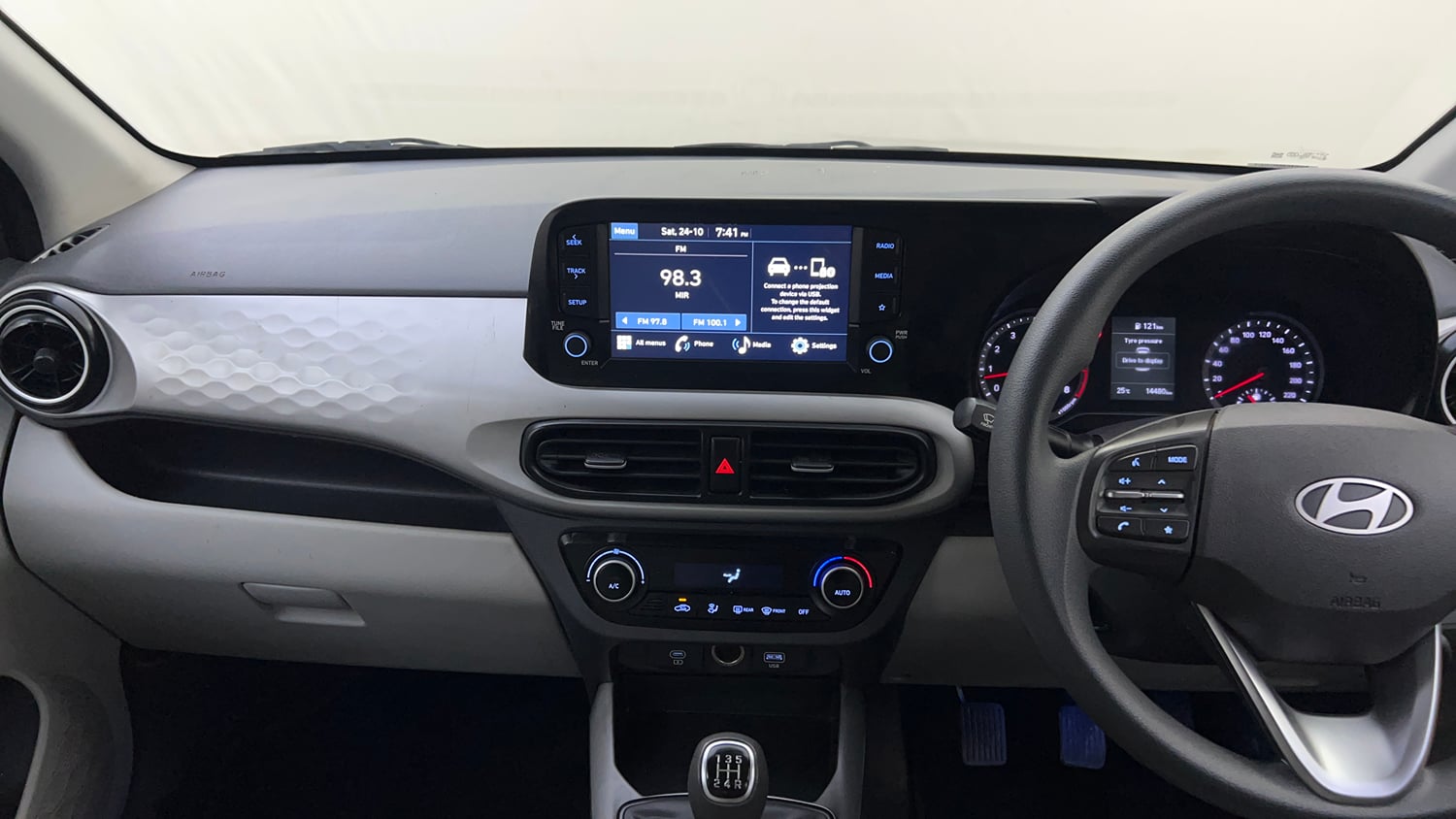 Used 2023 Hyundai Grand i10 Nios Sportz 1.2 Kappa VTVT Petrol Manual interior MUSIC SYSTEM & AC CONTROL VIEW