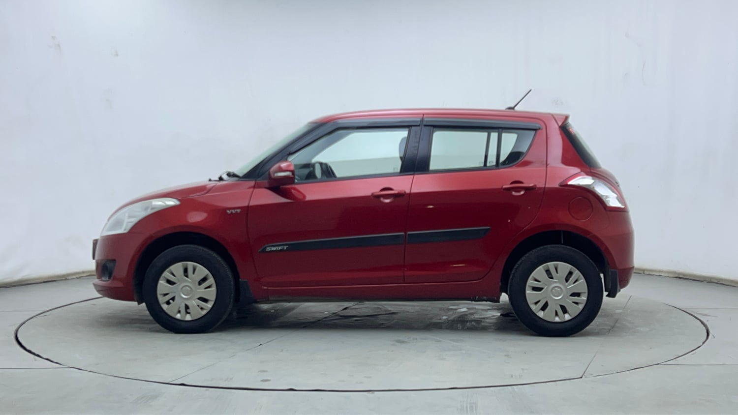 Used 2014 Maruti Suzuki Swift VXi Petrol Manual exterior LEFT SIDE VIEW