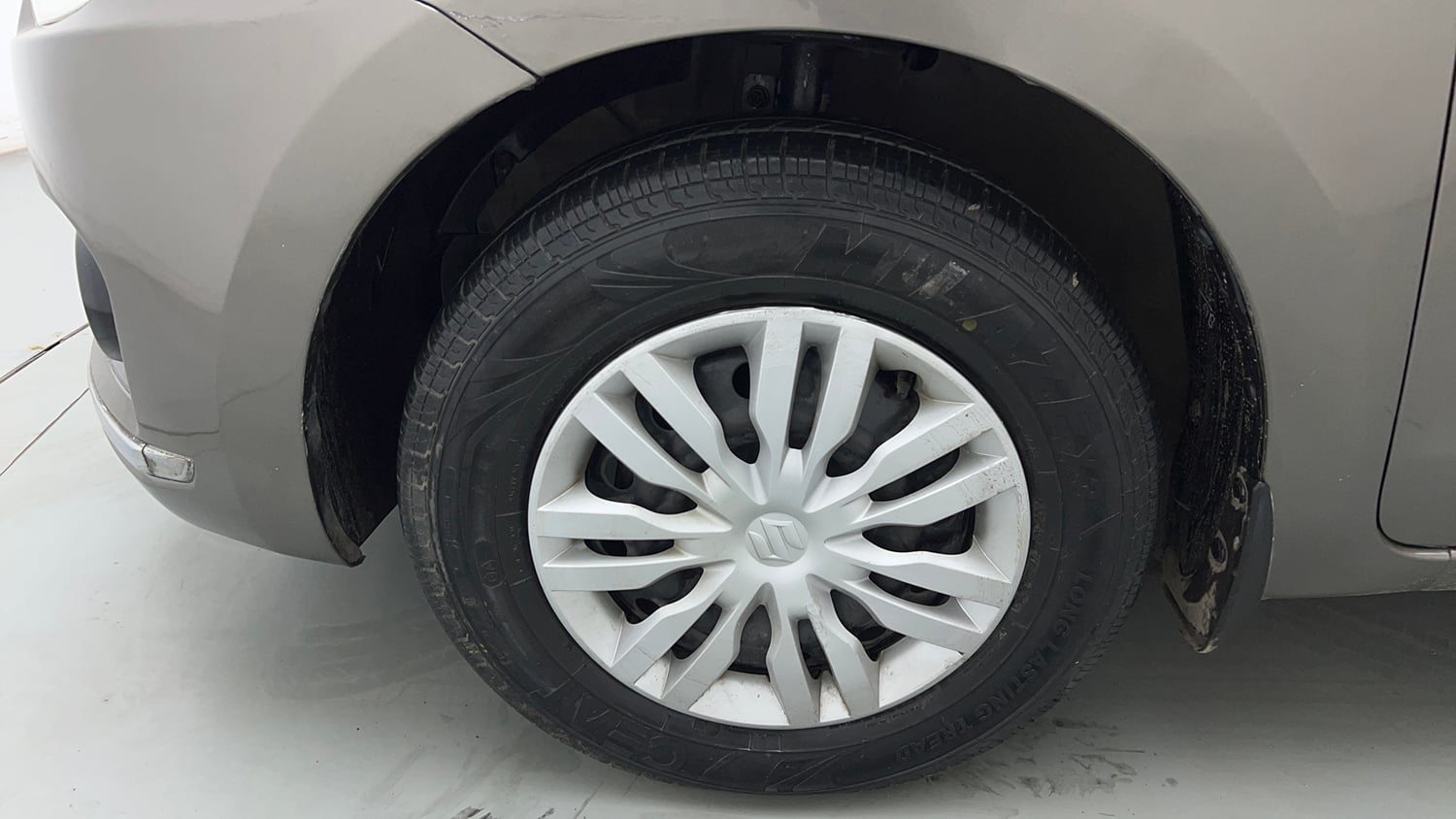 Used 2017 Maruti Suzuki Dzire VXi Petrol Manual tyres LEFT FRONT TYRE RIM VIEW