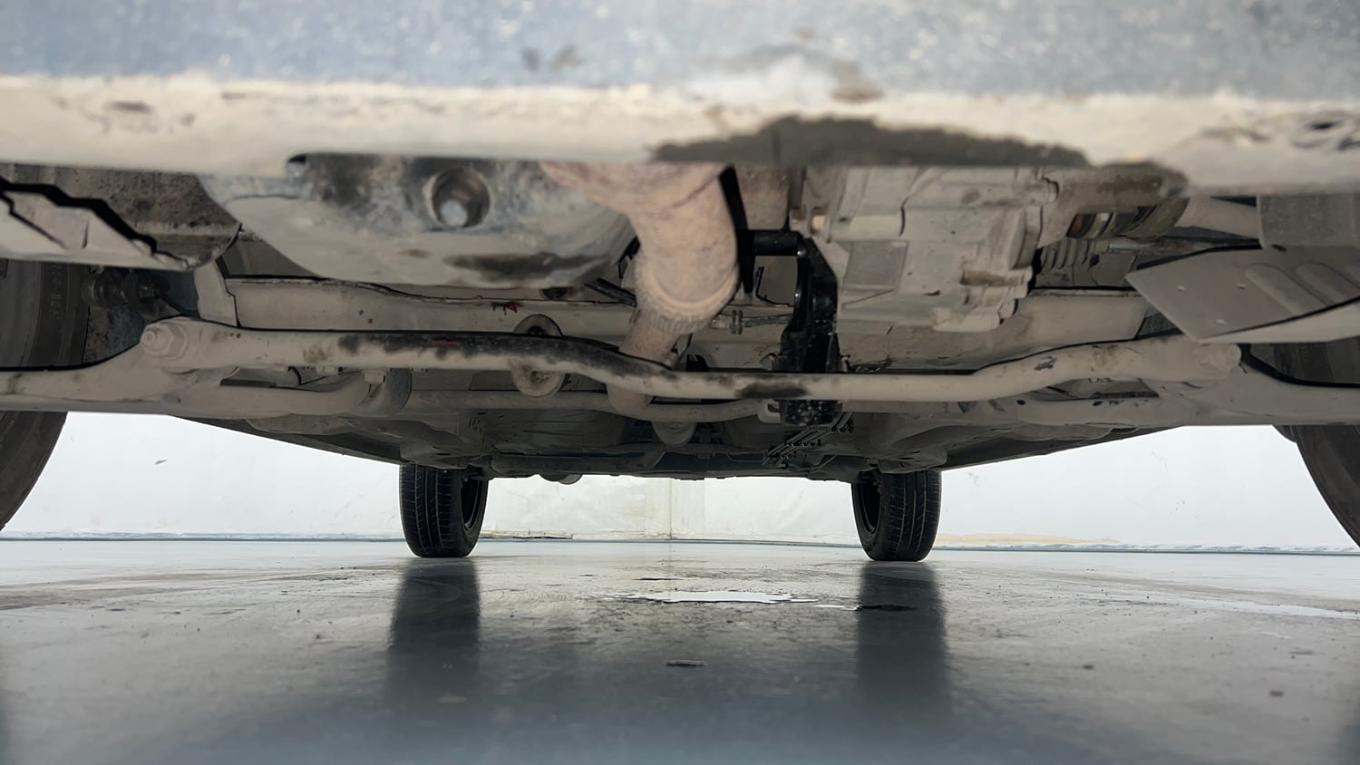 Used 2022 Tata Tiago XZ Petrol Manual extra FRONT LEFT UNDERBODY VIEW