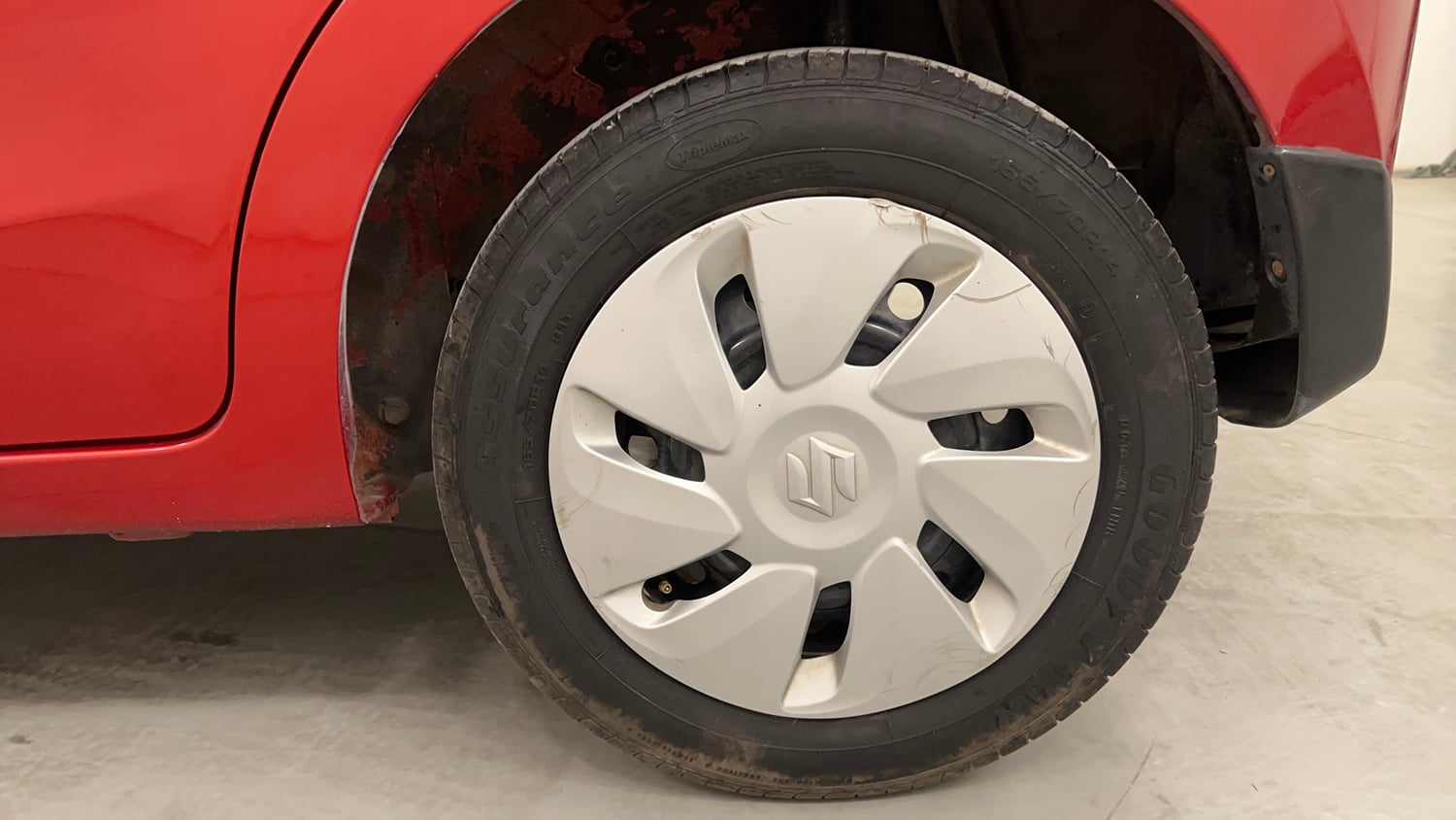 Used 2014 Maruti Suzuki Celerio VXi AMT Petrol Automatic tyres LEFT REAR TYRE RIM VIEW