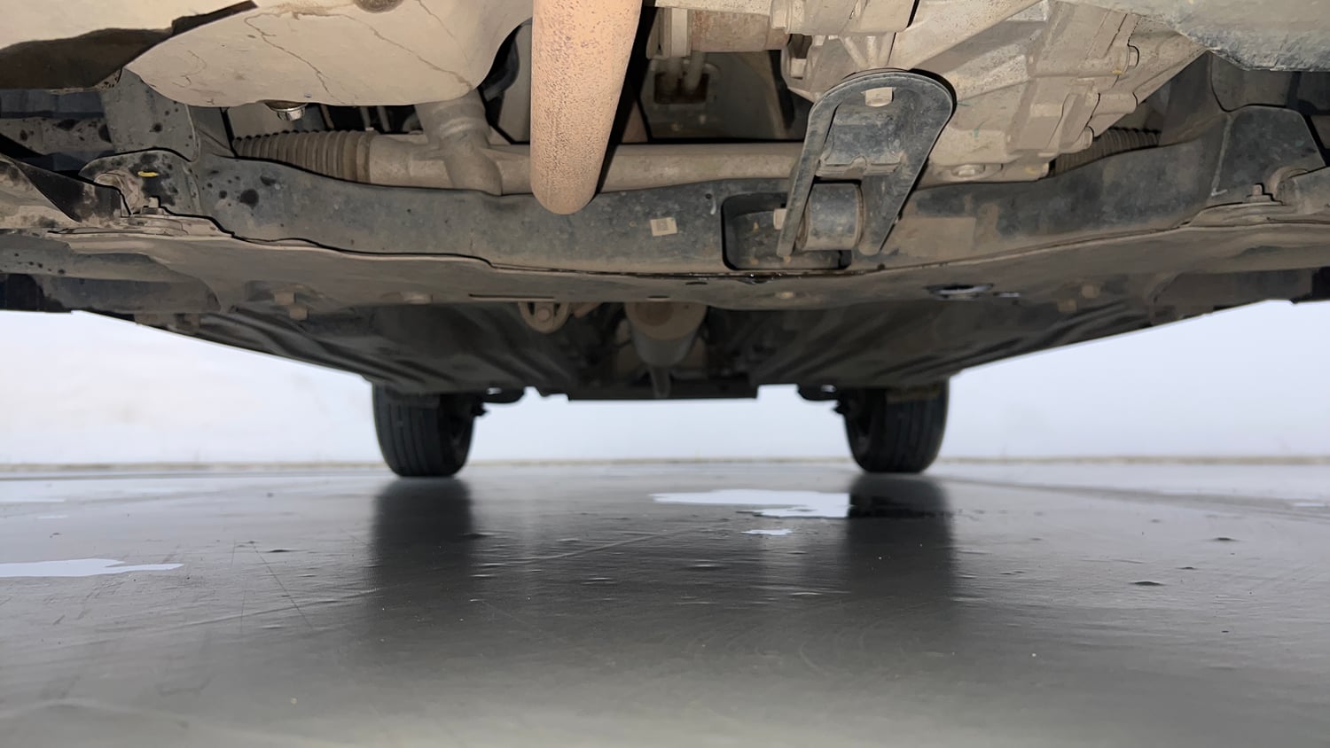Used 2023 Maruti Suzuki Brezza VXi Petrol Manual extra FRONT LEFT UNDERBODY VIEW