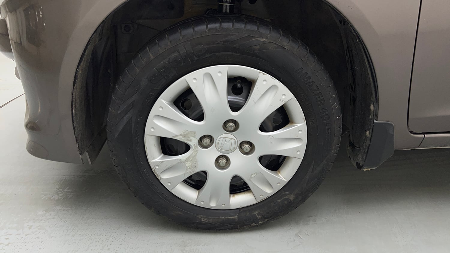 Used 2013 Honda Amaze 1.2 S i-VTEC Petrol Manual tyres LEFT FRONT TYRE RIM VIEW