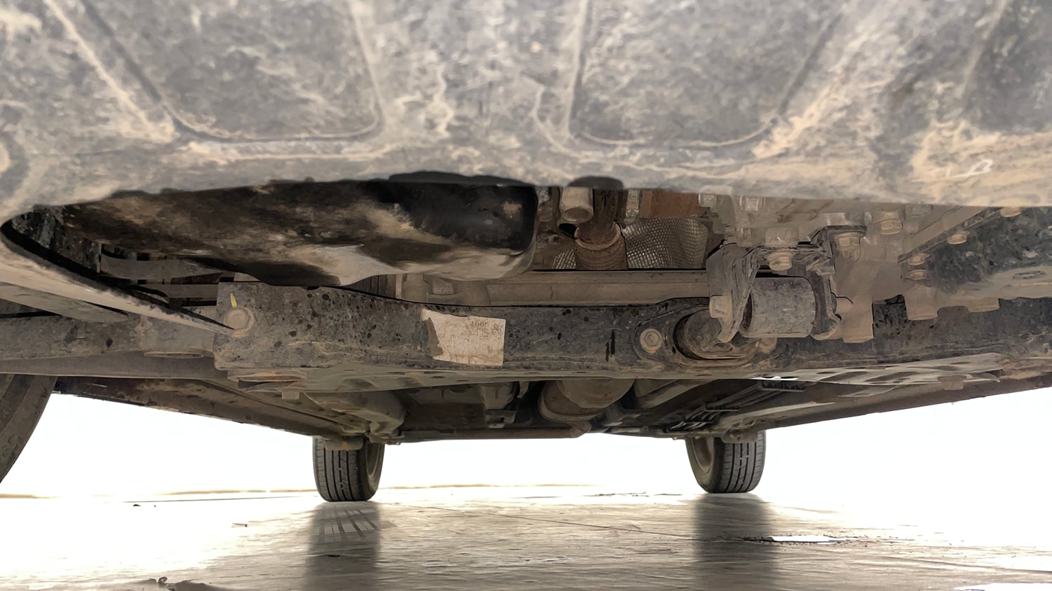 Used 2023 Hyundai New i20 Asta (O) 1.2 IVT Petrol Automatic extra FRONT LEFT UNDERBODY VIEW