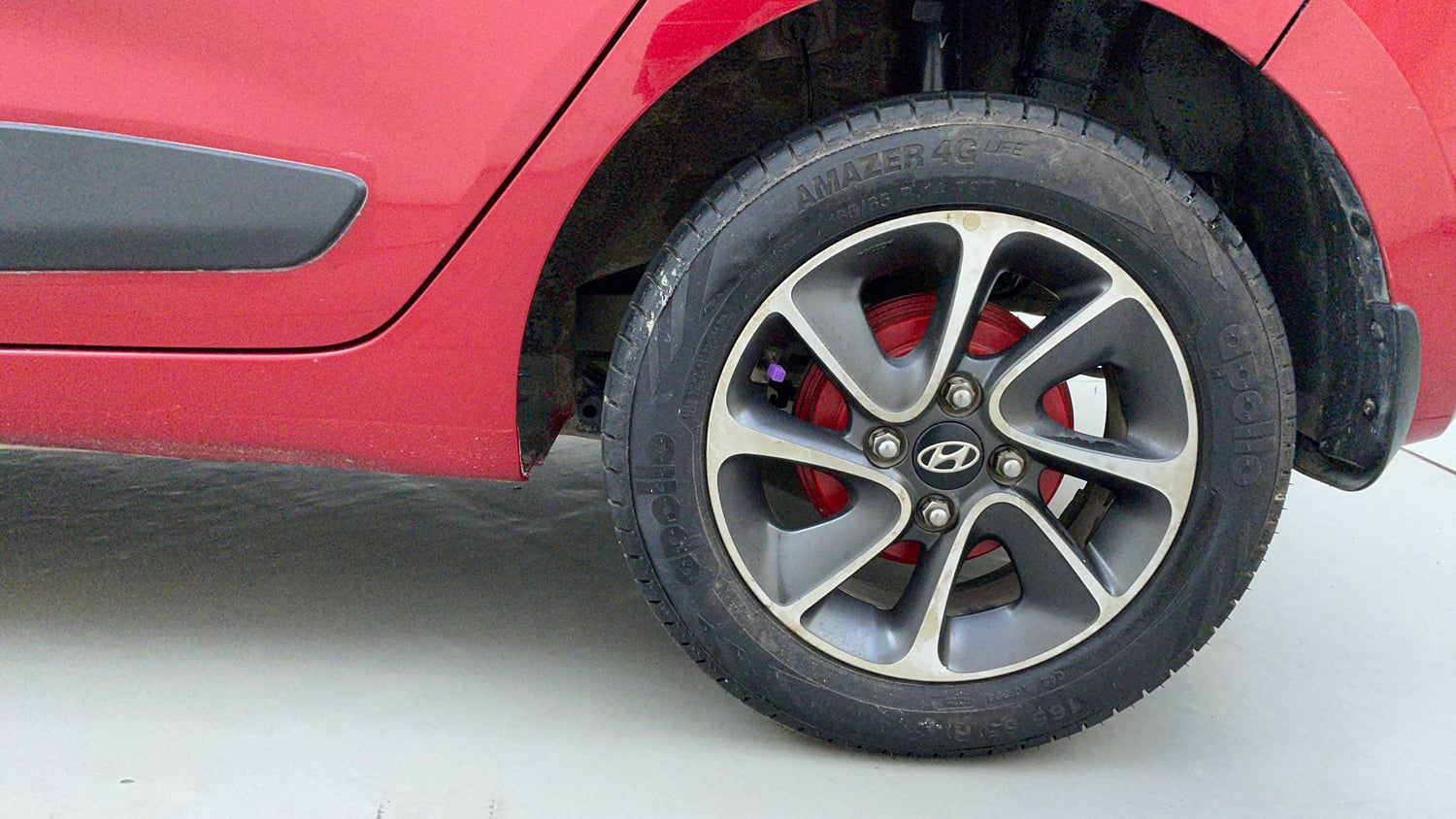 Used 2019 Hyundai Grand i10 Sportz 1.2 Kappa VTVT Petrol Manual tyres LEFT REAR TYRE RIM VIEW
