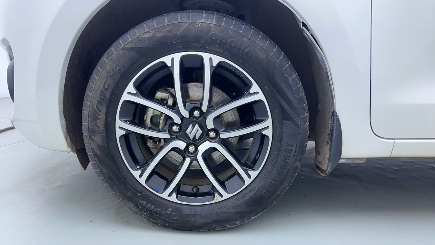 Used 2021 Maruti Suzuki Swift ZXi Plus Dual Tone Petrol Manual tyres LEFT FRONT TYRE RIM VIEW